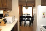 Mammoth Lakes Rental Sunshine Village 106 - Fully Equipped Kitchen Towards Dining Area